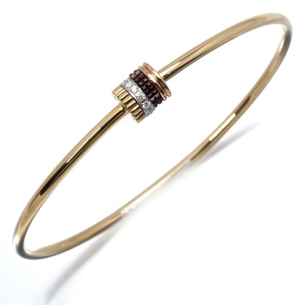 Rg Boucheron Bracelet Diamond Quatre Classique Bangle 18 Engraved 18K Yg/ Wg/: Rg Boucheron Bracelet Diamond Quatre Classique Bangle 18 Engraved 18K Yg/ Wg/ Experience the timeless elegance of Boucheron's iconic Quatre Classique bangle, adorned with a stunning natural diamond se