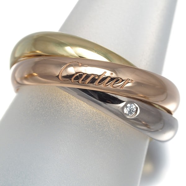 Rg Cartier Ring Diamond Trinity 3Color Classic 5P Eu51 18K Yg/ Wg/: Rg Cartier Ring Diamond Trinity 3Color Classic 5P Eu51 18K Yg/ Wg/ A stunning Cartier ring, crafted in 18k multi-tone gold, showcases three natural diamonds of exceptional quality, set in a classic de