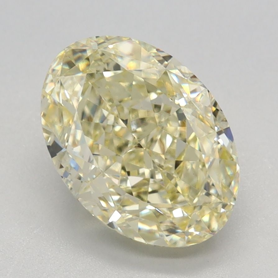 IGI Oval 2.15ct Fancy Yellow VVS2 Loose Lab Diamond: IGI Oval 2.15ct Fancy Yellow VVS2 Loose Lab Diamond Experience the warmth and uniqueness of a lab-grown Fancy Yellow diamond, certified by IGI as VVS2 in clarity and boasting an impressive 2.15 carats