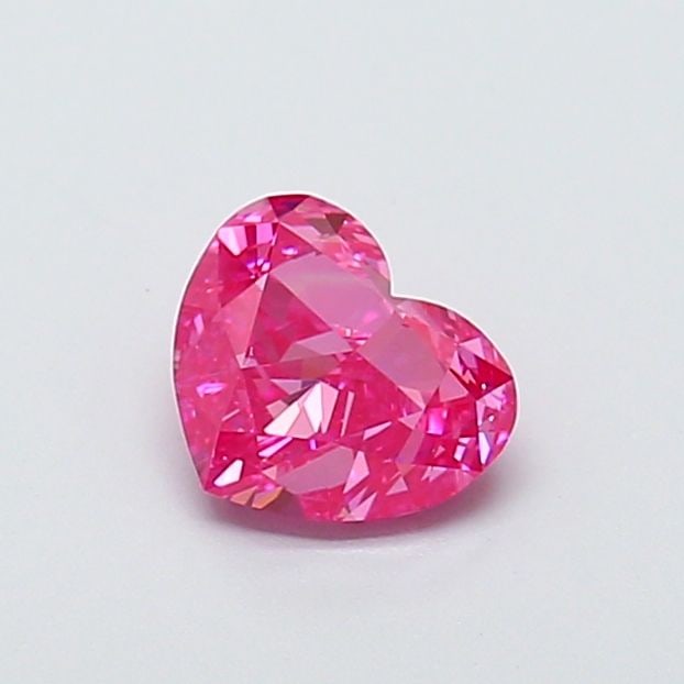 Loose Lab Diamond - IGI Heart 0.98ct Fancy Vivid Pink VVS2: Loose Lab Diamond - IGI Heart 0.98ct Fancy Vivid Pink VVS2 Experience the rare beauty of a lab-grown diamond, certified by IGI as Fancy Vivid Pink, with exceptional clarity and cut. This stunning 0.98