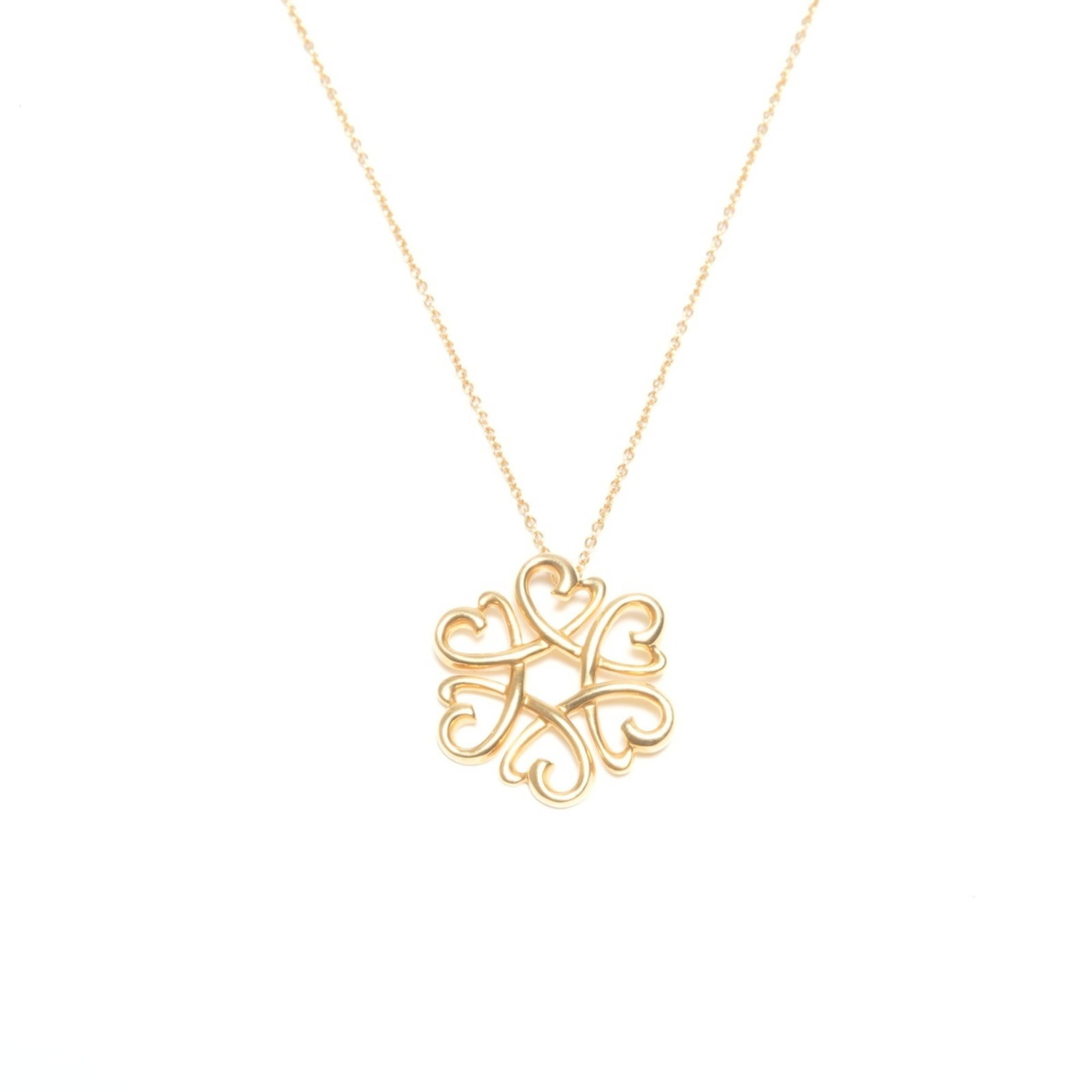 Tiffany & Co. 750 Gold Loving Heart Medallion Necklace: Tiffany & Co. 750 Gold Loving Heart Medallion Necklace Elevate your elegance with the timeless Tiffany & Co. 750 Gold Loving Heart Medallion Necklace, boasting a stunning gold medallion pendant adorne