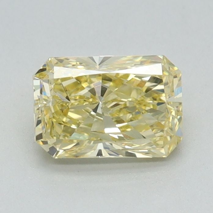IGI Radiant 0.7ct Fancy Vivid Yellow VVS2 Loose Lab Diamond: IGI Radiant 0.7ct Fancy Vivid Yellow VVS2 Loose Lab Diamond Experience the warmth and brightness of a genuine lab-grown diamond, certified by IGI as Fancy Vivid Yellow VVS2, with exceptional clarity,