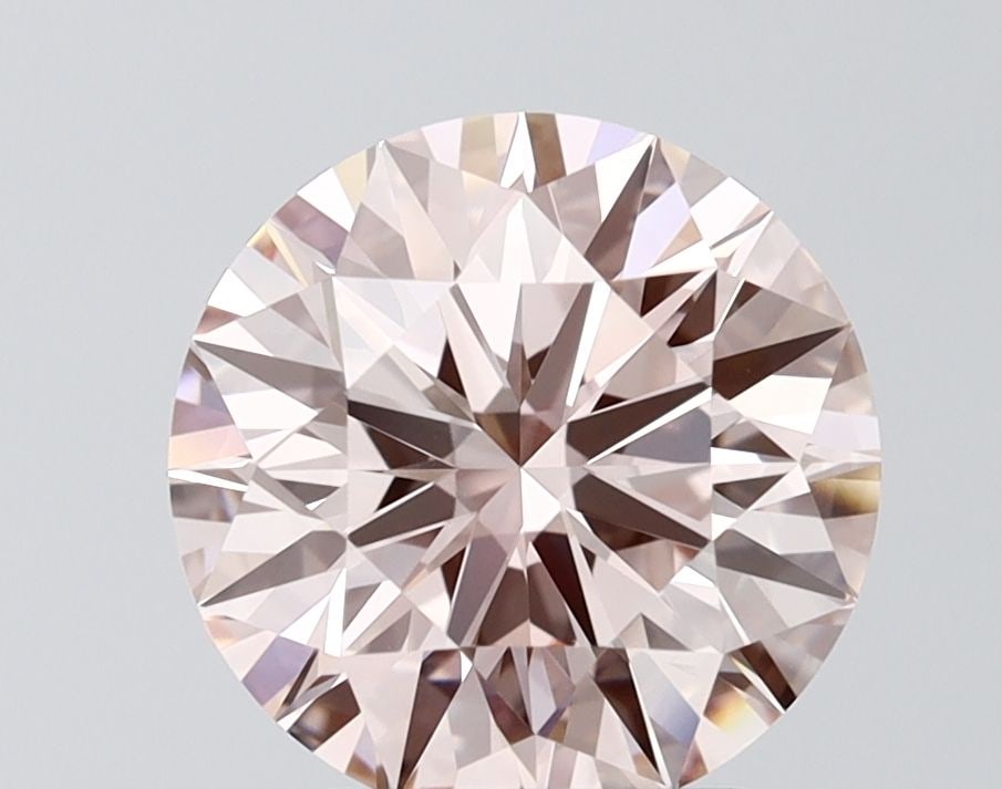 IGI Round 3.1ct Fancy Intense Pink VVS2 Ideal Loose Lab Diamond: IGI Round 3.1ct Fancy Intense Pink VVS2 Ideal Loose Lab Diamond Experience the rare beauty of a Fancy Intense Pink diamond, one of the most coveted colors in nature. This stunning 3.1ct lab-grown gem