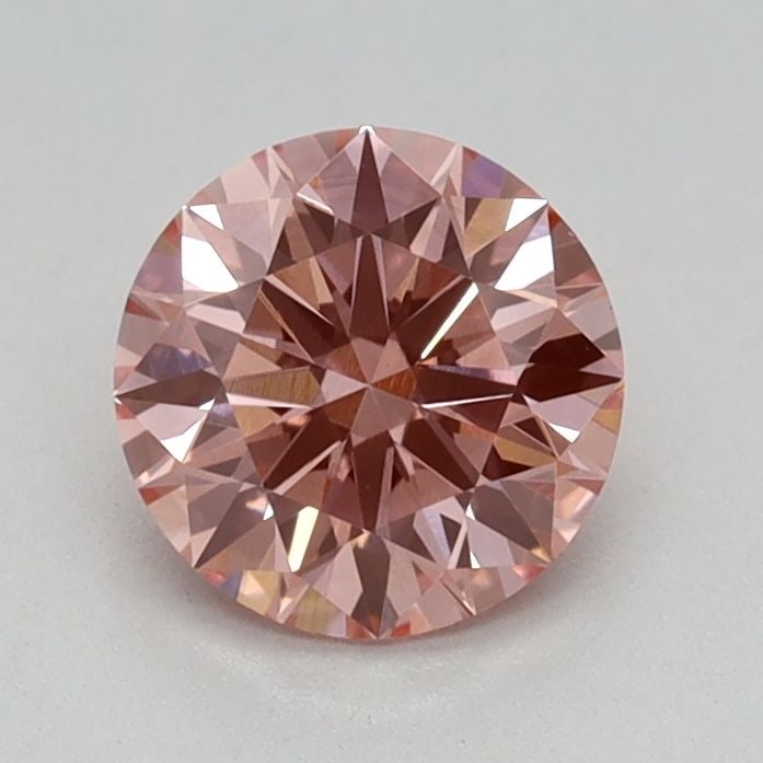 IGI Round 0.63ct Fancy Vivid Pink VVS2 Ideal Loose Lab Diamond: IGI Round 0.63ct Fancy Vivid Pink VVS2 Ideal Loose Lab Diamond Experience the breathtaking beauty of this 0.63ct Fancy Vivid Pink lab-grown diamond, certified by IGI and boasting exceptional clarity (