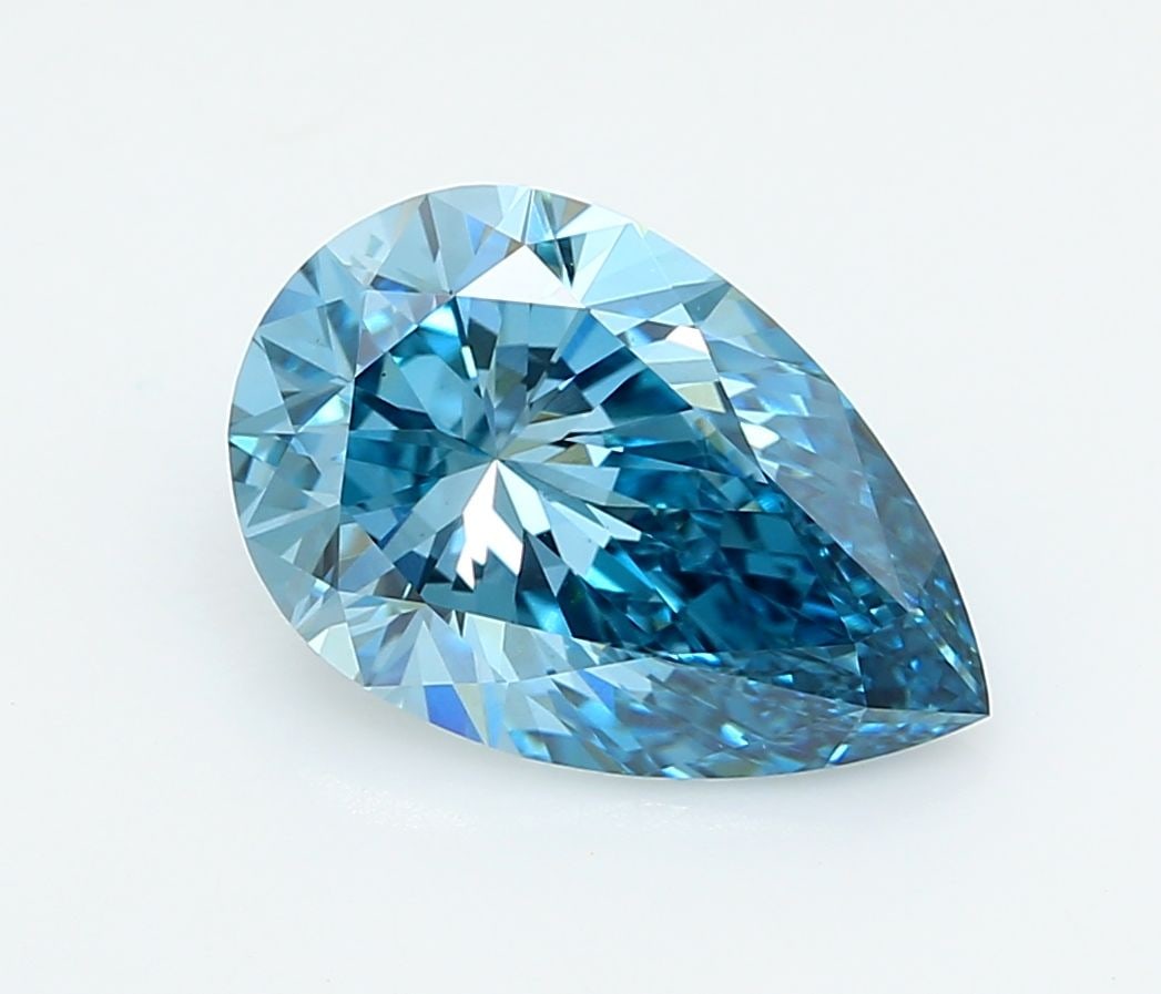 Loose Lab Diamond - IGI Pear 4.03ct Fancy Vivid Blue VVS2: Loose Lab Diamond - IGI Pear 4.03ct Fancy Vivid Blue VVS2 Experience the breathtaking beauty of a lab-grown diamond, certified by the International Gemological Institute (IGI) as Fancy Vivid Blue, wit
