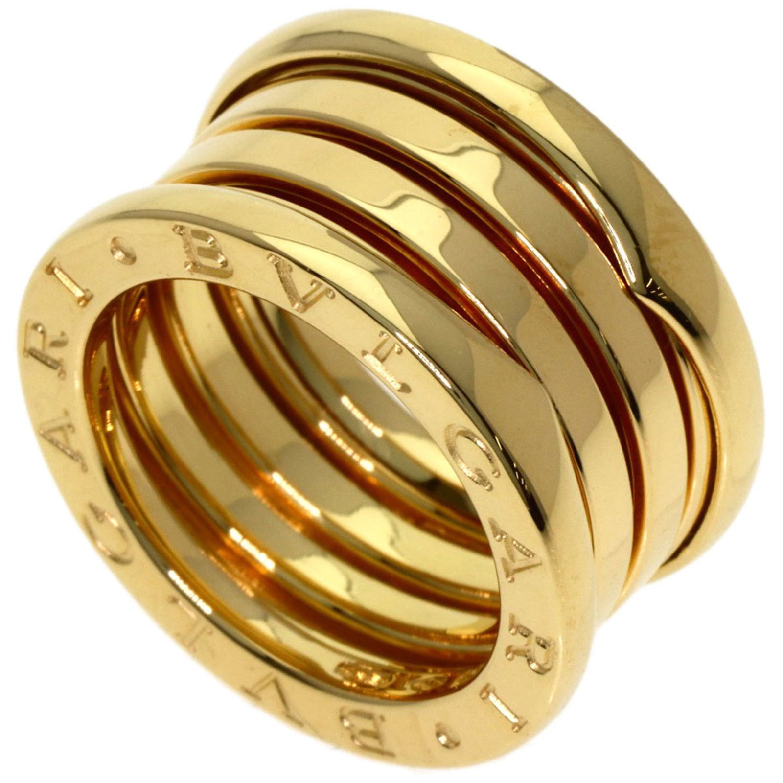 BVLGARI B-zero1 4-Band #48 18K Yellow Gold Ring for Women: BVLGARI B-zero1 4-Band #48 18K Yellow Gold Ring for Women Elevate your style with the BVLGARI B-zero1 4-Band #48, a stunning 18K yellow gold ring that exudes luxury and sophistication. This sleek desi