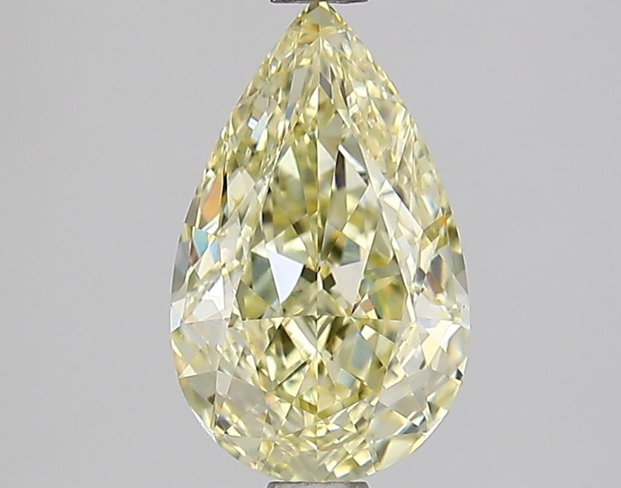 Loose Lab Diamond - IGI Pear 1.52ct Fancy Yellow VVS2: Loose Lab Diamond - IGI Pear 1.52ct Fancy Yellow VVS2 A truly unique and rare find, this 1.52ct Fancy Yellow Lab diamond boasts exceptional clarity (VVS2) and polish (EX), giving it a dazzling brillia