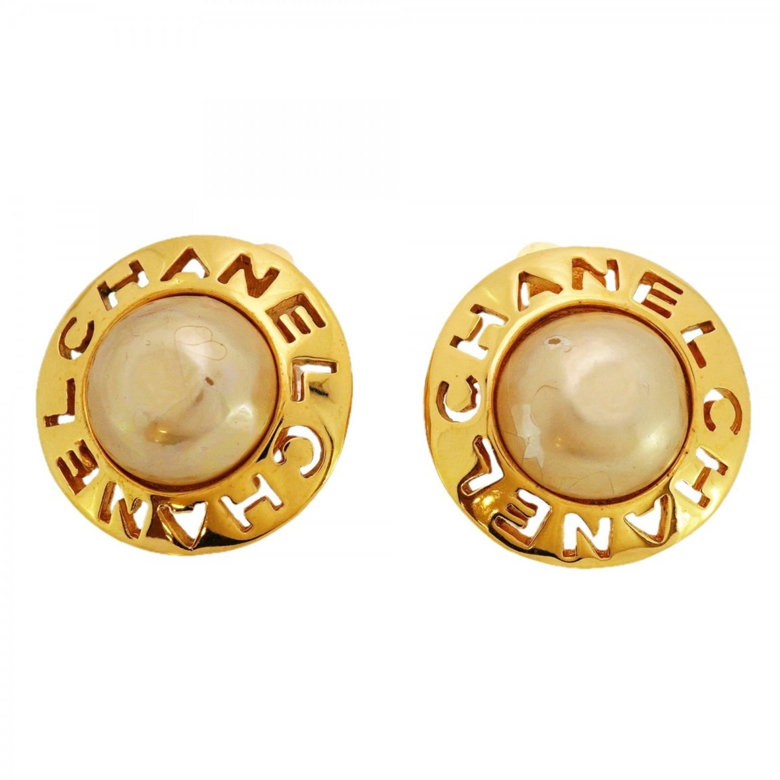 Chanel Clip Earrings in Gold Plating: Chanel Clip Earrings in Gold Plating Elevate your everyday style with these stunning Chanel clip earrings, featuring the iconic brand's signature gold plating finish that adds a touch of luxury to any