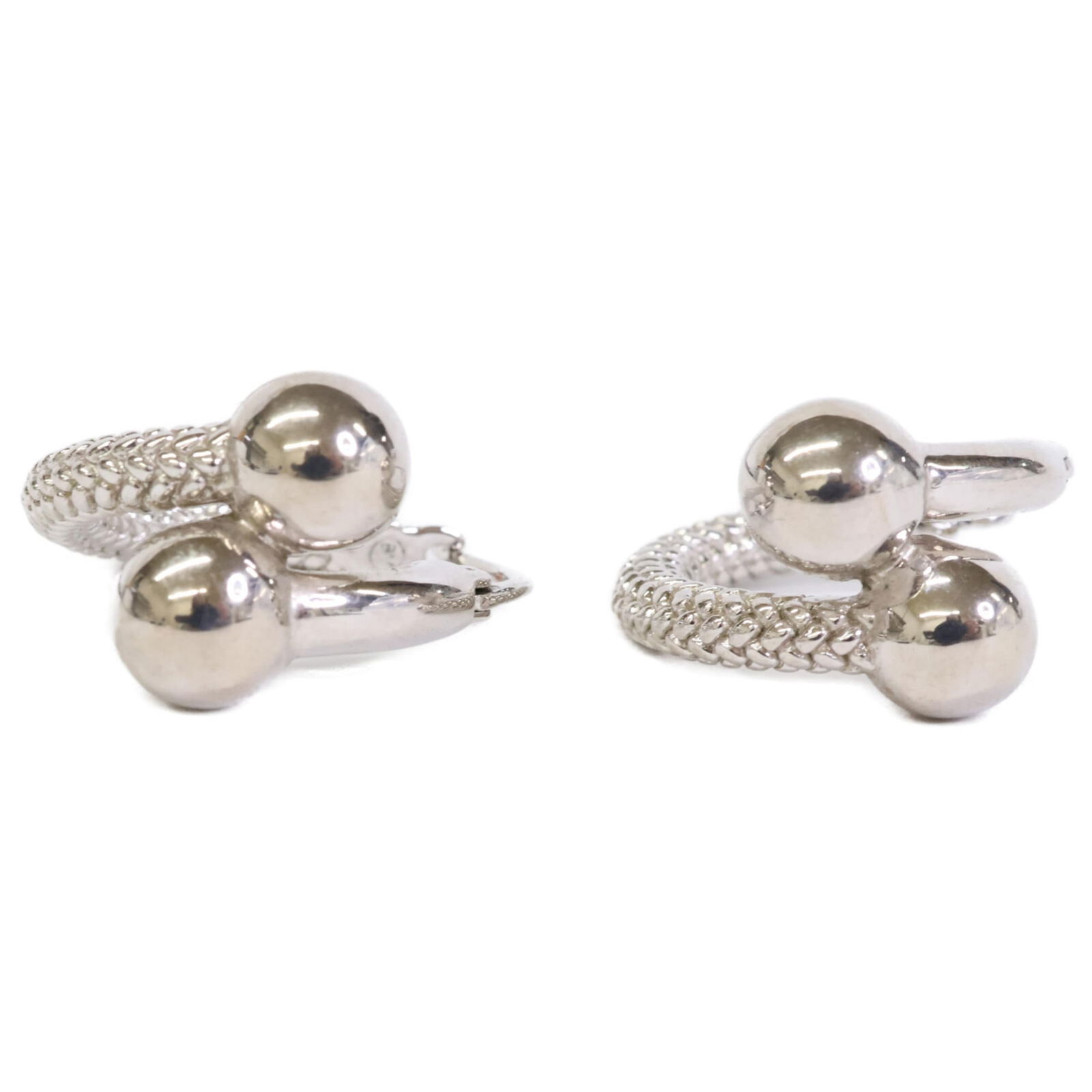 Bottega Veneta Hoop Earrings in Silver: Bottega Veneta Hoop Earrings in Silver Elevate your everyday style with these iconic Bottega Veneta hoop earrings in silver. Crafted from high-quality metal, these understated yet sophisticated earrin