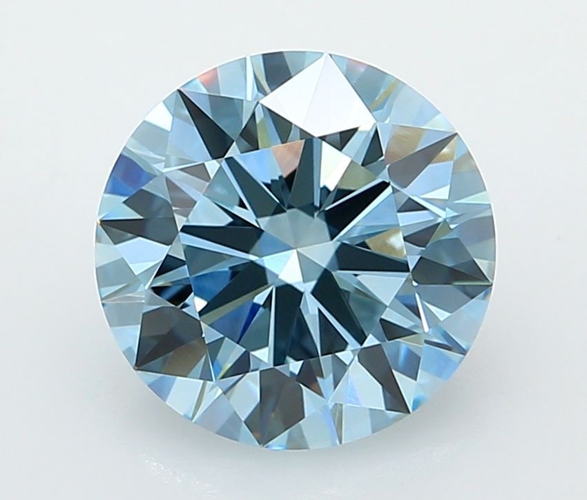 IGI Round 3.04ct Fancy Vivid Blue VVS2 Ideal Loose Lab Diamond: IGI Round 3.04ct Fancy Vivid Blue VVS2 Ideal Loose Lab Diamond Experience the breathtaking beauty of a Fancy Vivid Blue diamond, one of the rarest and most coveted colors in nature. This exquisite 3.0