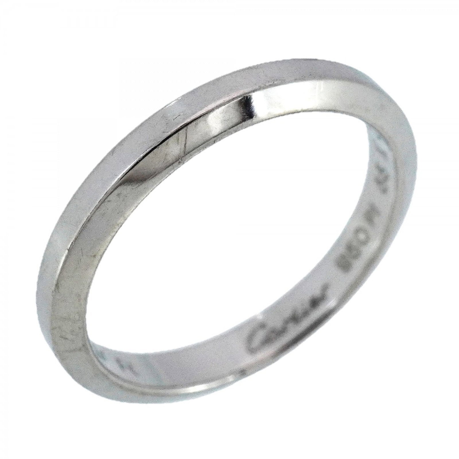 Cartier Platinum 950 Band Ring: Cartier Platinum 950 Band Ring A sleek and sophisticated platinum band ring from Cartier, this 55mm wide ring boasts the iconic brand's signature style with a touch of luxury. With its high-quality pl