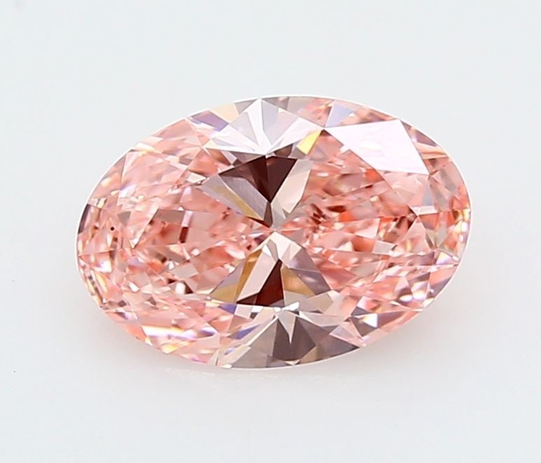 IGI Oval 1.98ct Fancy Vivid Pink VVS2 Loose Lab Diamond: IGI Oval 1.98ct Fancy Vivid Pink VVS2 Loose Lab Diamond Experience the rare beauty of a Fancy Vivid Pink diamond, one of the most coveted colors in the world of gemstones. This exquisite 1.98ct