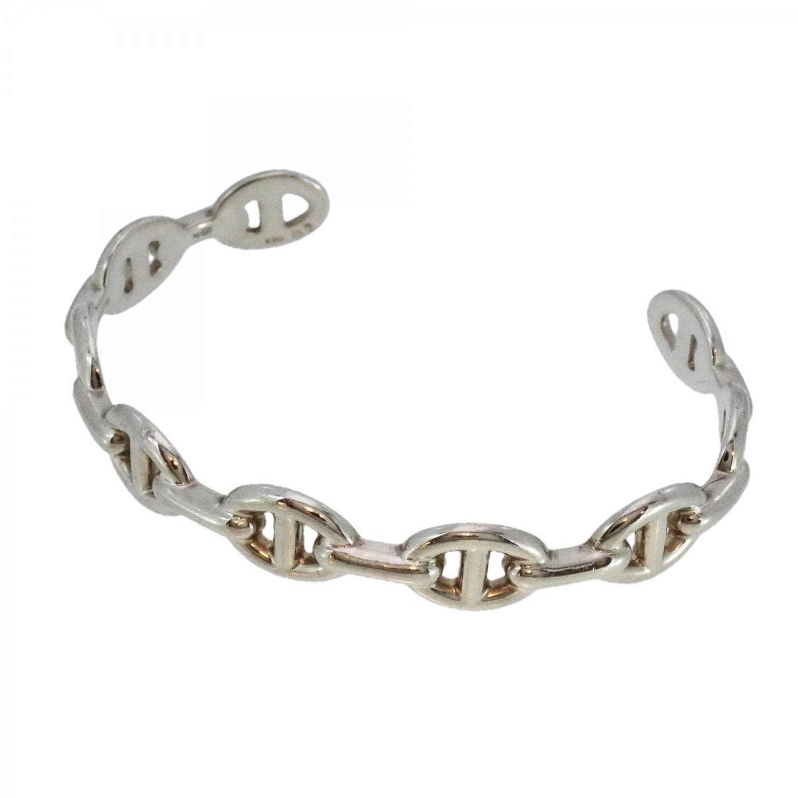 Hermes Silver 925 Bangle: Hermes Silver 925 Bangle A sleek and sophisticated silver bangle from the renowned French fashion house Hermes, crafted from high-quality 925 sterling silver with a classic design that suits both men