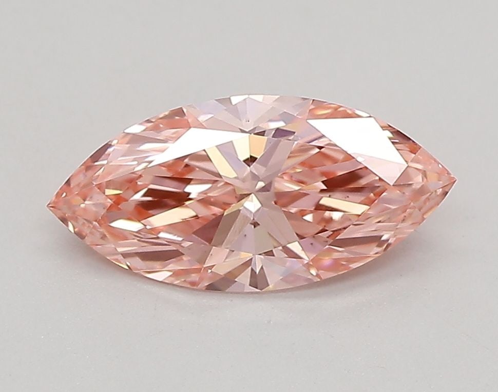 IGI Marquise 0.82ct Fancy Vivid Pink VVS2 Loose Lab Diamond: IGI Marquise 0.82ct Fancy Vivid Pink VVS2 Loose Lab Diamond Experience the breathtaking beauty of a Fancy Vivid Pink diamond, one of the rarest and most coveted colors in nature. This exquisite 0.82ct