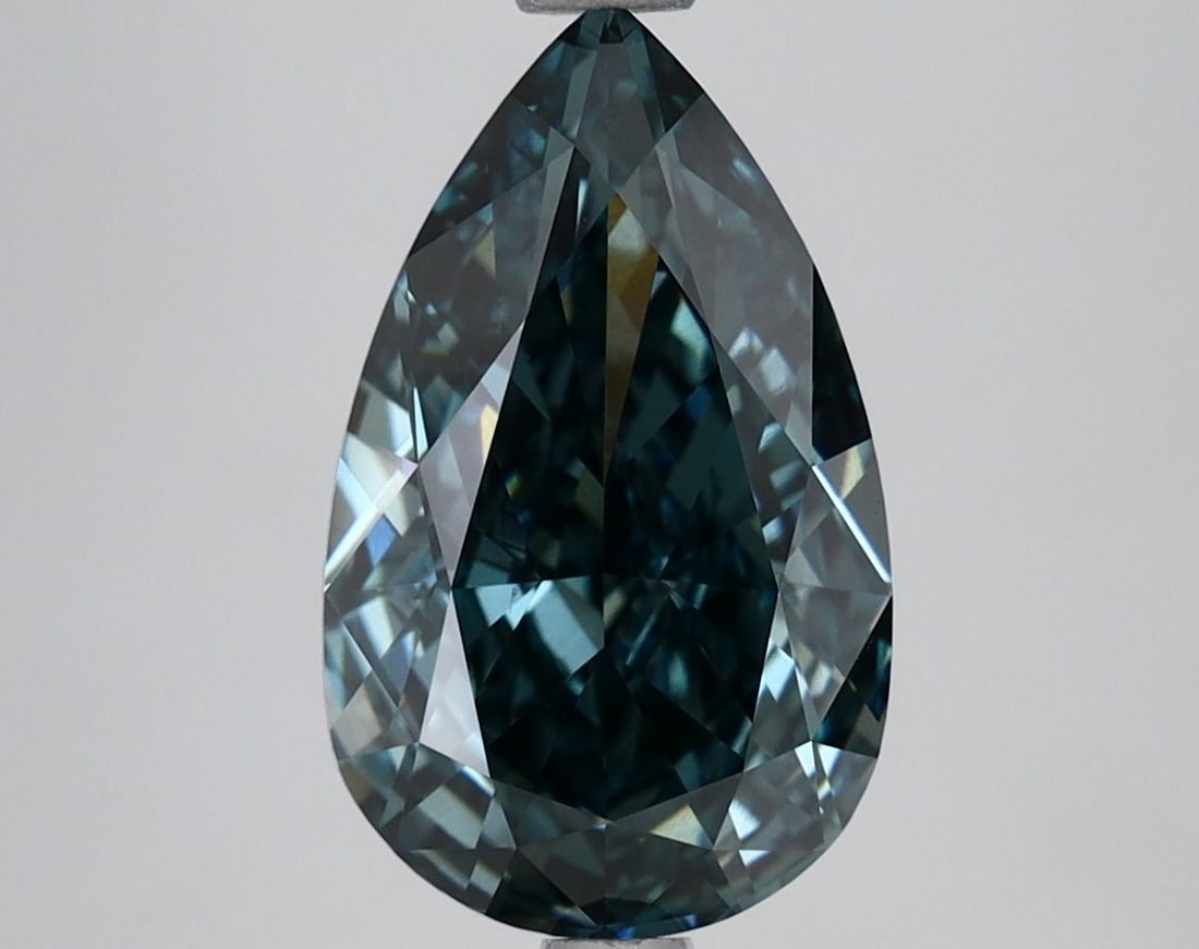 Loose Lab Diamond - IGI Pear 3.34ct Fancy Deep Blueish Green VVS2: Loose Lab Diamond - IGI Pear 3.34ct Fancy Deep Blueish Green VVS2 Experience the rare beauty of a lab-grown diamond, boasting a stunning Fancy Deep Blueish Green hue reminiscent of a tropical paradise