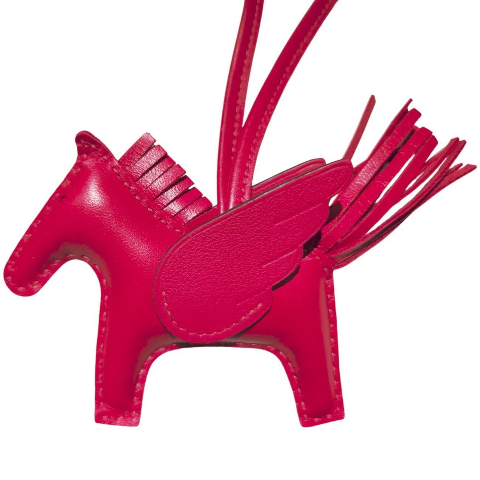 Hermes Agneau Milo Handbag Charm: Hermes Agneau Milo Handbag Charm A rare find for the Hermes collector, this Agneau Milo handbag charm boasts the iconic brand's signature style and craftsmanship, featuring the luxurious Agneau Milo m