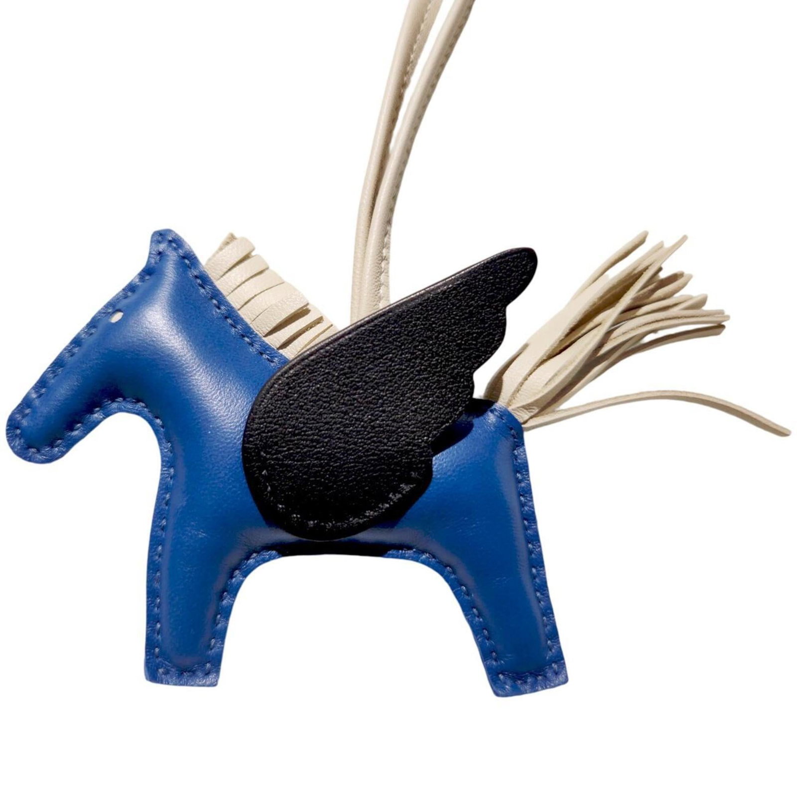 Hermes Agneau Milo Handbag Charm: Hermes Agneau Milo Handbag Charm A sleek and sophisticated addition to any handbag, the Hermes Agneau Milo charm boasts the iconic brand's signature style with its luxurious black and blue hues. Made