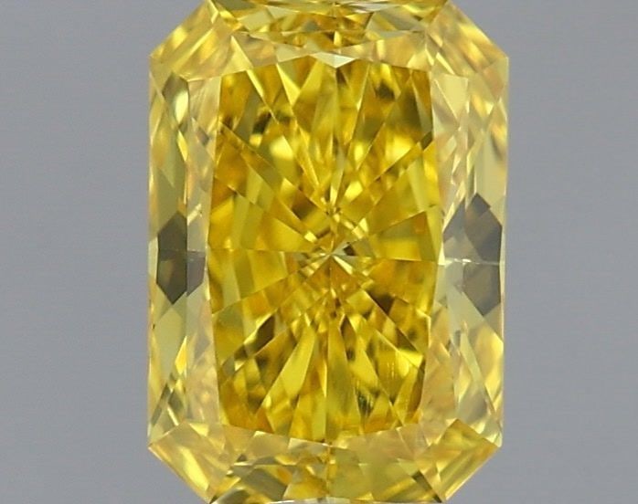 IGI Radiant 1.0ct Fancy Vivid Yellow VVS2 Loose Lab Diamond: IGI Radiant 1.0ct Fancy Vivid Yellow VVS2 Loose Lab Diamond Experience the warmth and brightness of a lab-grown fancy vivid yellow diamond, boasting exceptional clarity (VVS2) and polish (VG). This st