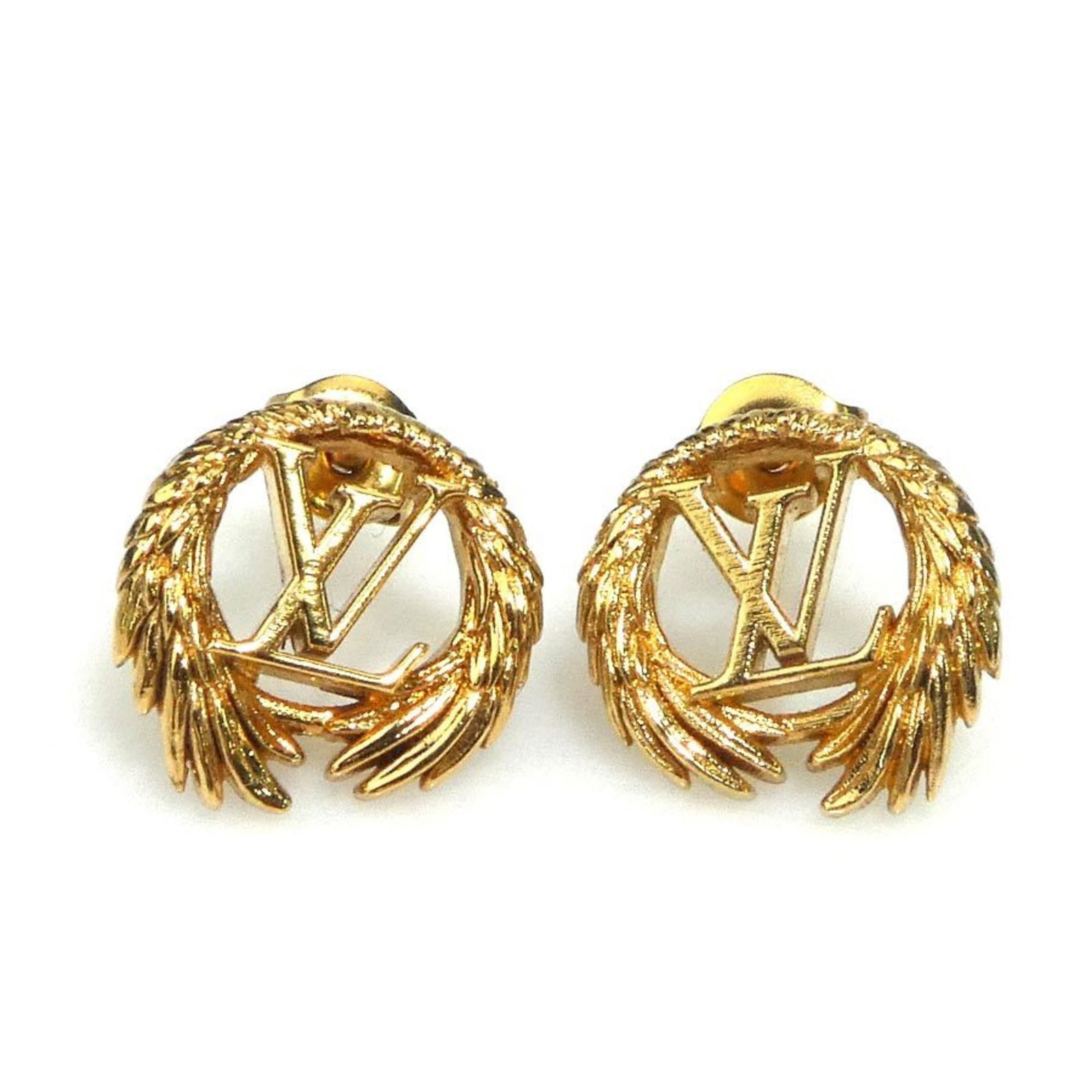Louis Vuitton Stud Earrings in Metal: Louis Vuitton Stud Earrings in Metal Elevate your style with these luxurious Louis Vuitton stud earrings, crafted from high-quality metal and adorned with the iconic LV monogram in gold. The subtle