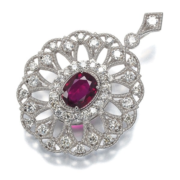 Platinum Milgrain Pendant with 0.606ct Ruby and 0.52ct Diamond: Platinum Milgrain Pendant with 0.606ct Ruby and 0.52ct Diamond Elevate your elegance with this stunning platinum milgrain pendant, set with a vibrant 0.606ct ruby and a sparkling 0.52ct diamond. Craft
