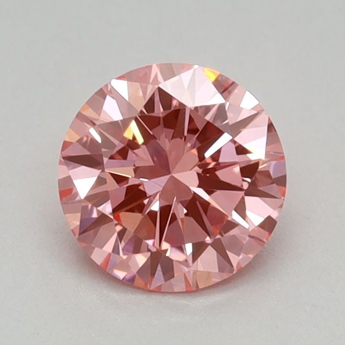 IGI Round 0.43ct Fancy Vivid Pink VVS2 Diamond: IGI Round 0.43ct Fancy Vivid Pink VVS2 Diamond Experience the rare beauty of a Fancy Vivid Pink diamond, one of the most coveted colors in the world of gemology. This exquisite 0.43ct lab-grown stone