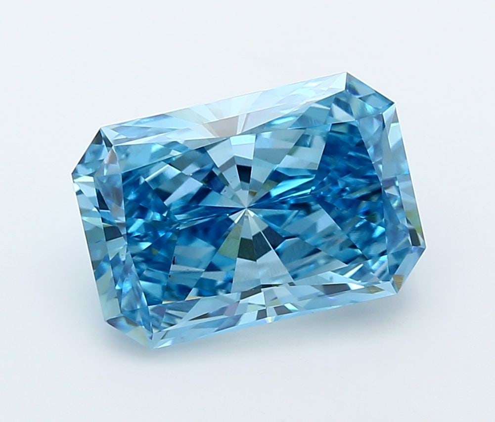IGI Radiant 5.13ct Fancy Vivid Blue VVS2 Loose Lab Diamond: IGI Radiant 5.13ct Fancy Vivid Blue VVS2 Loose Lab Diamond Experience the breathtaking beauty of a Fancy Vivid Blue diamond, one of the rarest and most stunning colors in nature. This exceptional