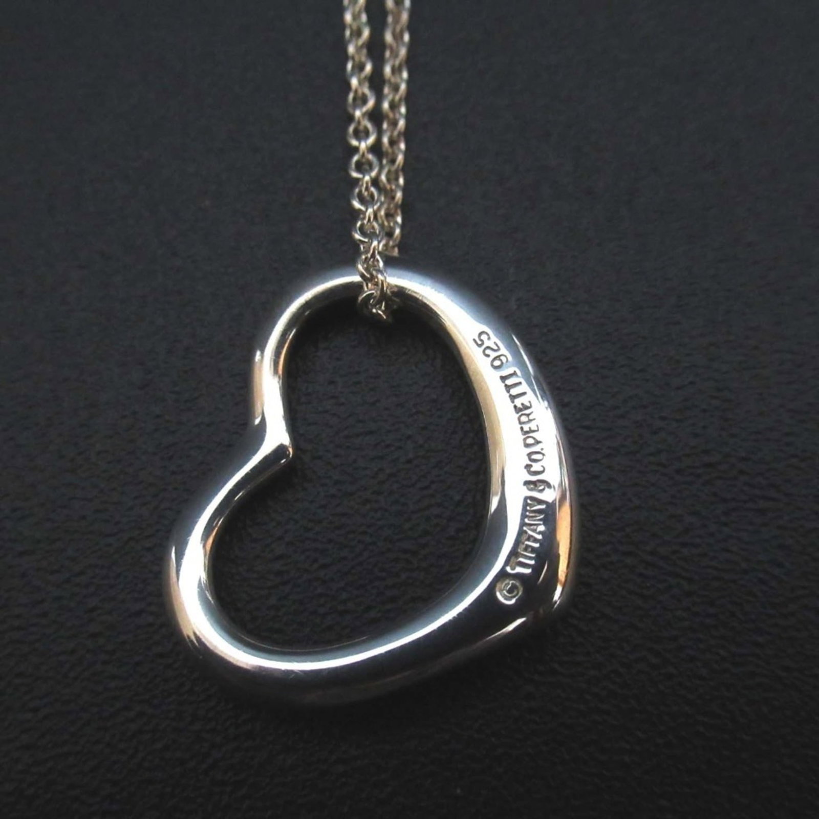 Tiffany & Co. Elsa Peretti Open Heart 925 SV Silver Pendant for Women: Tiffany & Co. Elsa Peretti Open Heart 925 SV Silver Pendant for Women Elevate your style with the iconic Elsa Peretti Open Heart 925 SV Silver Pendant from Tiffany & Co., a timeless design that exudes