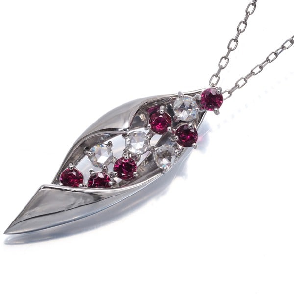 Platinum Ruby 0.35Ct Rose-Cut Diamond 0.23Ct Necklace 950 850: Platinum Ruby 0.35Ct Rose-Cut Diamond 0.23Ct Necklace 950 850 Experience the elegance of a natural ruby, expertly set in a platinum rose-cut diamond pendant necklace. This exquisite piece boasts a stu