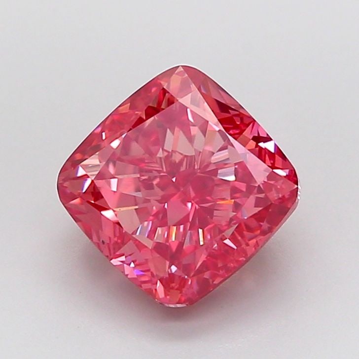 Loose 2.59ct Fancy Vivid Pink VVS2 IGI Cushion Modified Diamond: Loose 2.59ct Fancy Vivid Pink VVS2 IGI Cushion Modified Diamond Experience the rare beauty of a Fancy Vivid Pink diamond, one of the most coveted colors in nature. This stunning 2.59ct cushion-cut gem