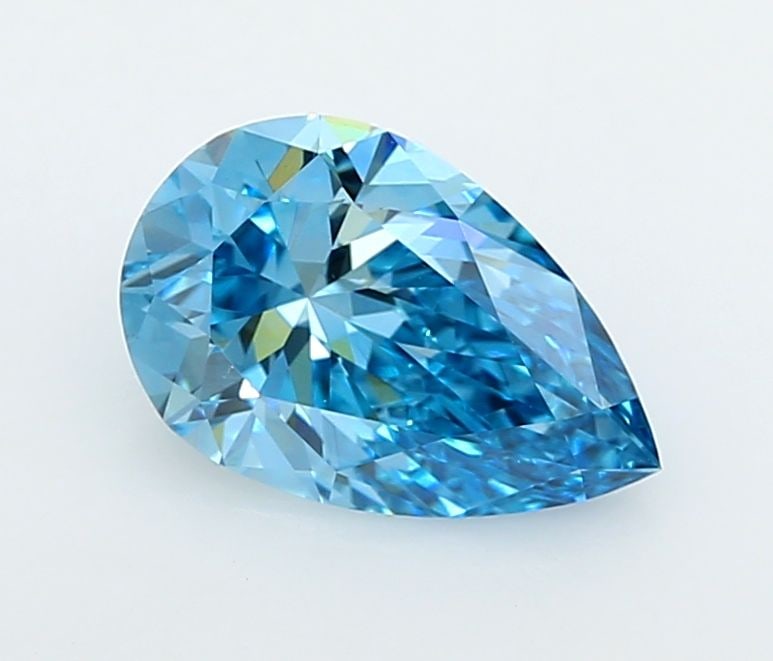 Loose Lab Diamond - IGI Pear 1.56ct Fancy Vivid Blue VVS2: Loose Lab Diamond - IGI Pear 1.56ct Fancy Vivid Blue VVS2 A stunning Fancy Vivid Blue lab diamond, certified by the International Gemological Institute (IGI), boasts exceptional clarity and polish wit