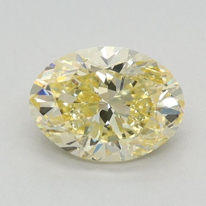 IGI Oval 0.77ct Fancy Intense Yellow VVS2 Loose Lab Diamond: IGI Oval 0.77ct Fancy Intense Yellow VVS2 Loose Lab Diamond Experience the vibrant beauty of nature in a lab-grown diamond, certified by the International Gemological Institute (IGI) as Fancy Intense