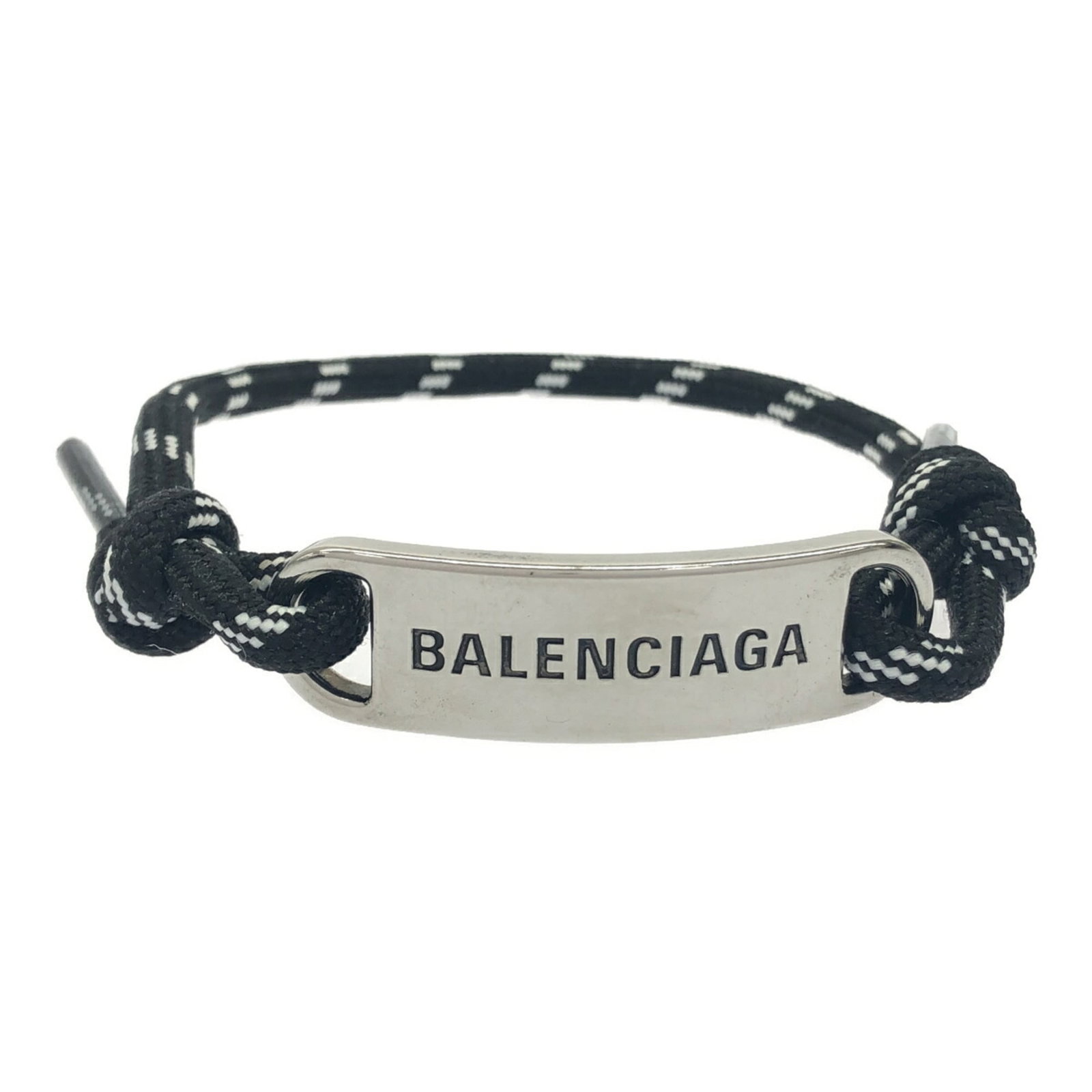Bracelet Balenciaga Charm: Bracelet Balenciaga Charm A sleek and sophisticated charm bracelet from the renowned Balenciaga brand, this 30cm black charm is marked by its subtle silver tone and delicate width of just 1.5cm. With
