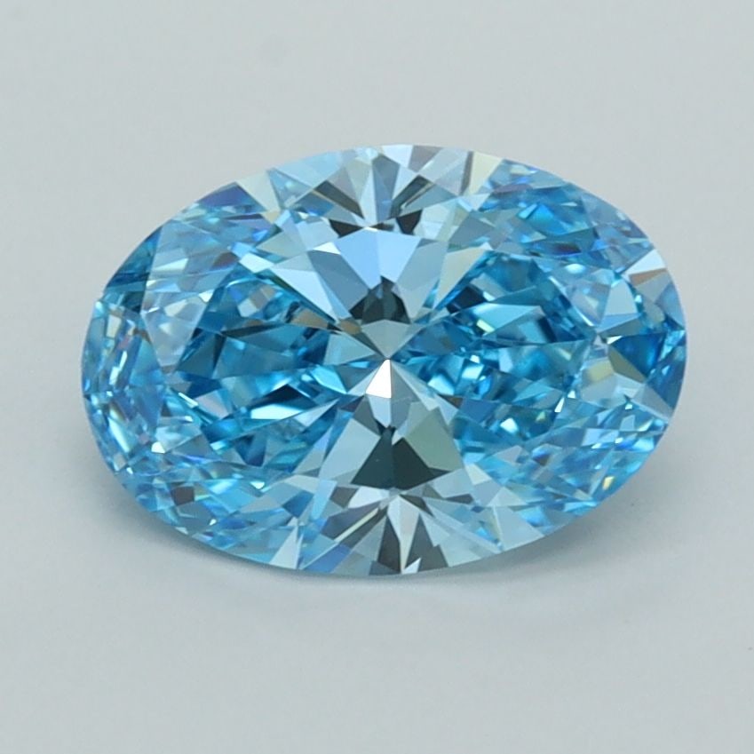 IGI Oval 1.55ct Fancy Vivid Blue VVS2 Loose Lab Diamond: IGI Oval 1.55ct Fancy Vivid Blue VVS2 Loose Lab Diamond Experience the breathtaking beauty of this 1.55ct Fancy Vivid Blue lab-grown diamond, boasting an exceptional VVS2 clarity and EX polish. Its vi