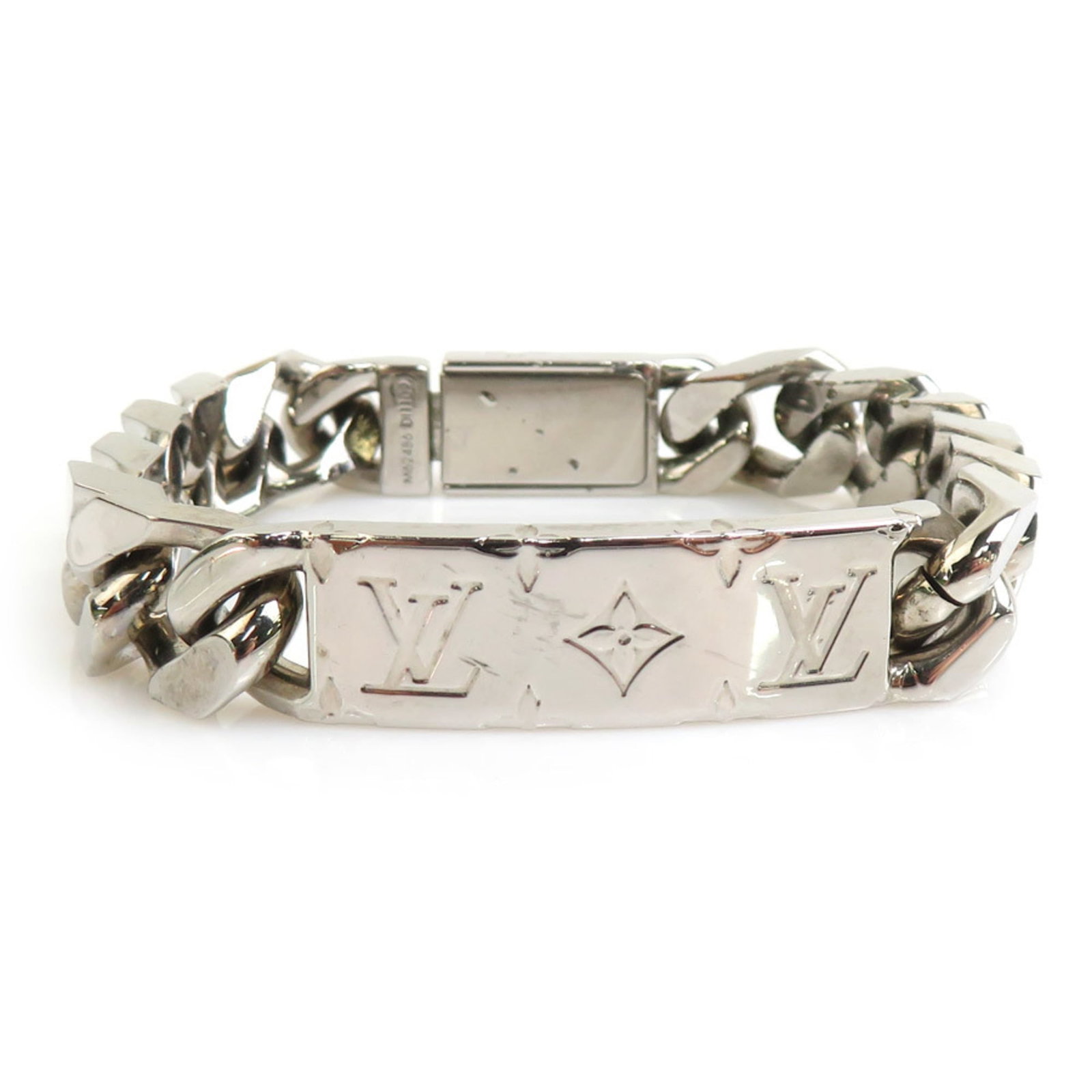 Louis Vuitton Charm Metal Bracelet: Louis Vuitton Charm Metal Bracelet A sleek and sophisticated accessory for the modern gentleman, this Louis Vuitton charm metal bracelet boasts a timeless silver finish and a classic design that exude