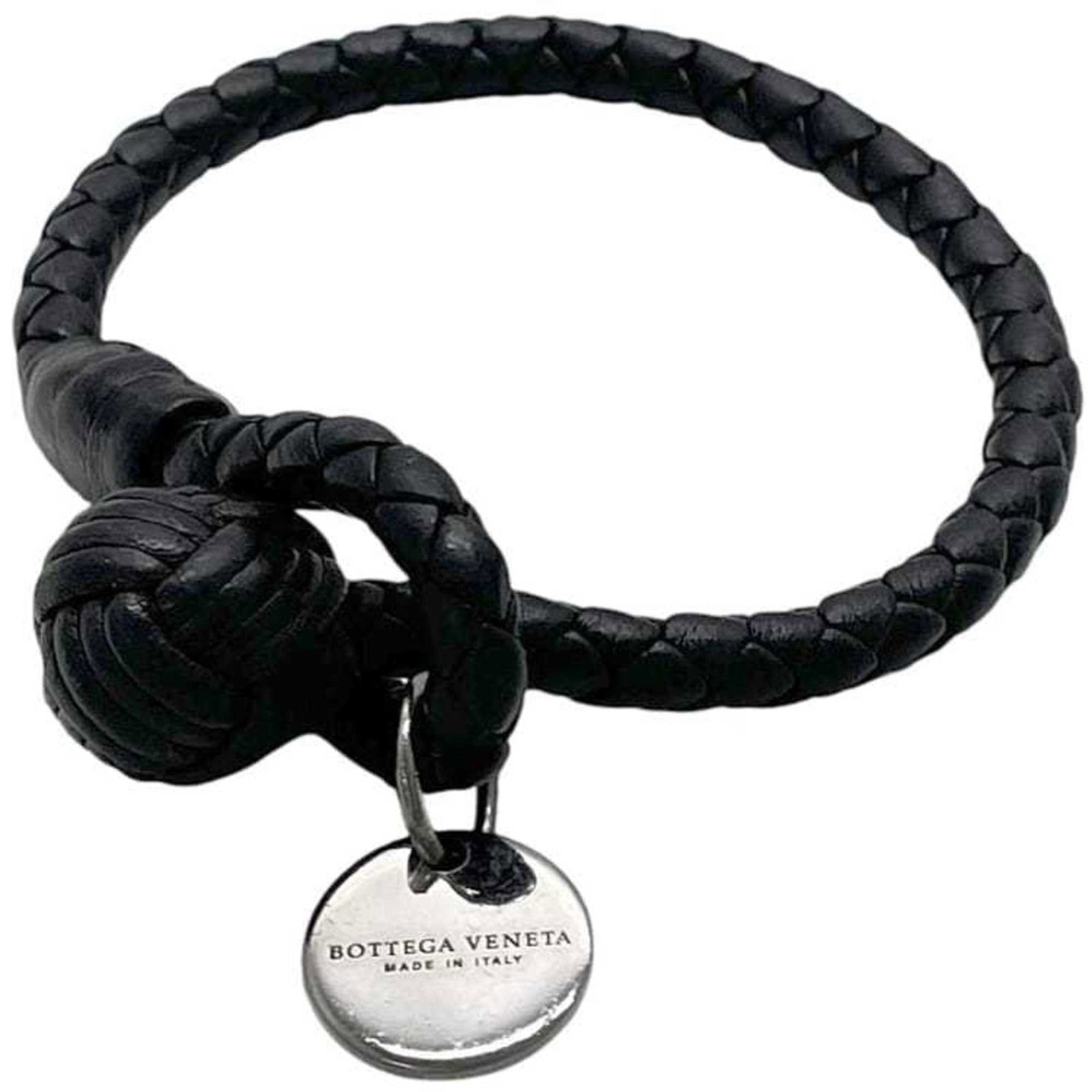 Bottega Veneta Leather Charm Bracelet: Bottega Veneta Leather Charm Bracelet A timeless Bottega Veneta leather charm bracelet, crafted from rich brown leather and adorned with subtle scratches that add to its understated elegance. With a c