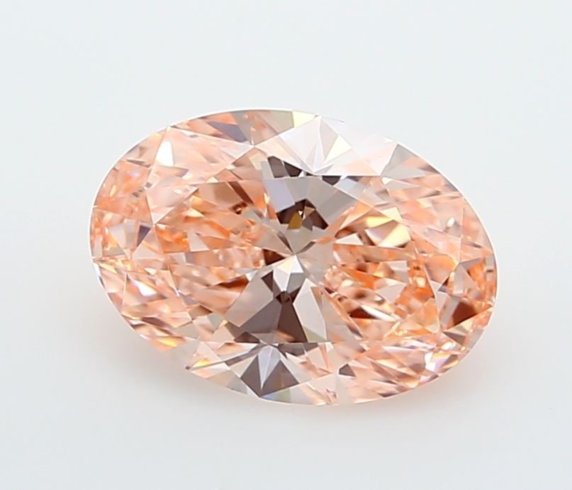 IGI Oval 1.54ct Fancy Vivid Pink VVS2 Loose Lab Diamond: IGI Oval 1.54ct Fancy Vivid Pink VVS2 Loose Lab Diamond Experience the rare beauty of a Fancy Vivid Pink diamond, one of the most coveted colors in diamonds. This stunning 1.54ct lab-grown gem boasts