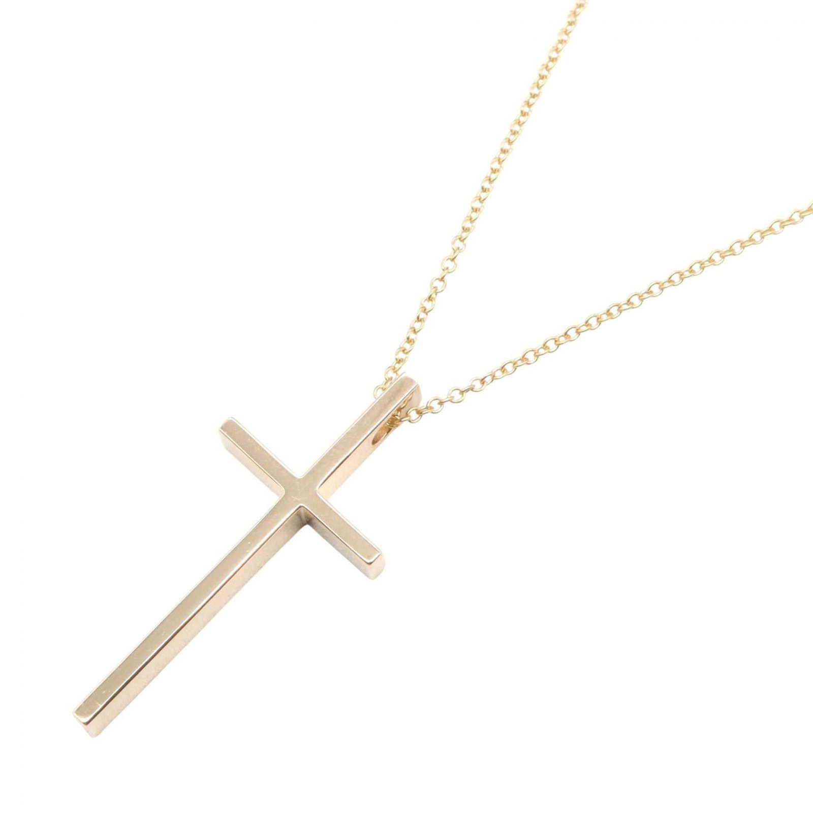 Tiffany & Co. Cross Necklace in 18K Yellow Gold for Women: Tiffany & Co. Cross Necklace in 18K Yellow Gold for Women Elevate your style with the timeless elegance of Tiffany & Co.'s iconic cross necklace, crafted in 18K yellow gold and boasting a classic desi