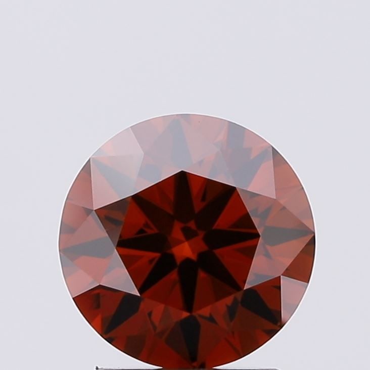 IGI Round 1.78ct Fancy Deep Orange VVS2 Ideal Loose Lab Diamond: IGI Round 1.78ct Fancy Deep Orange VVS2 Ideal Loose Lab Diamond Experience the vibrant beauty of nature in this stunning 1.78ct Fancy Deep Orange VVS2 Ideal loose lab diamond, certified by the Interna