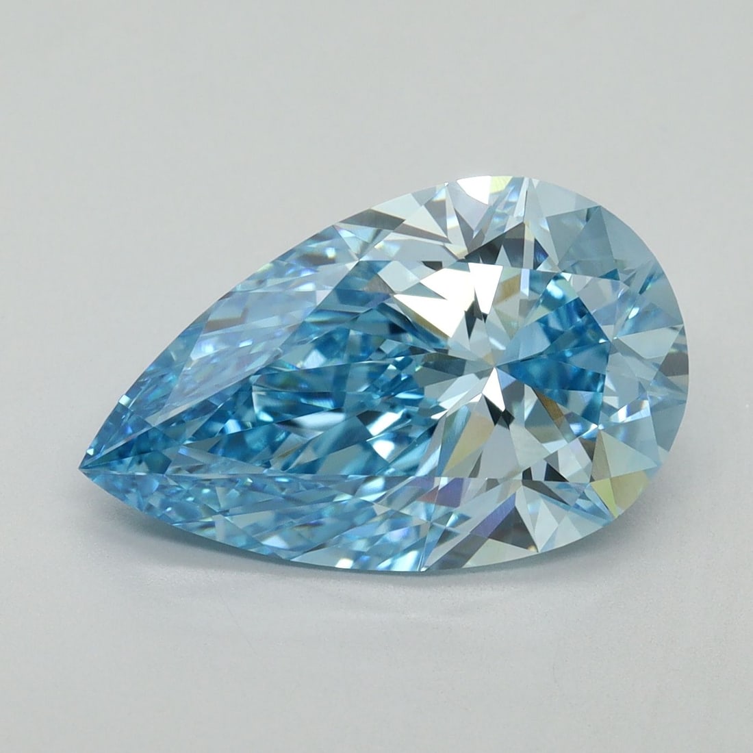 Loose Lab Diamond - IGI Pear 5.06ct Fancy Vivid Blue VVS2: Loose Lab Diamond - IGI Pear 5.06ct Fancy Vivid Blue VVS2 Experience the breathtaking beauty of a lab-grown diamond, certified by IGI as Fancy Vivid Blue, with exceptional clarity and cut quality. Thi