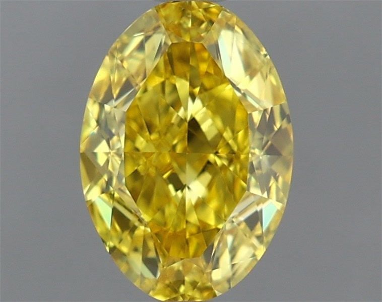 IGI Oval 1.58ct Fancy Vivid Yellow VVS1 Loose Lab Diamond: IGI Oval 1.58ct Fancy Vivid Yellow VVS1 Loose Lab Diamond Experience the brilliance of a lab-grown diamond, certified by IGI as Fancy Vivid Yellow with exceptional clarity and cut. This 1.58ct VVS1 ge