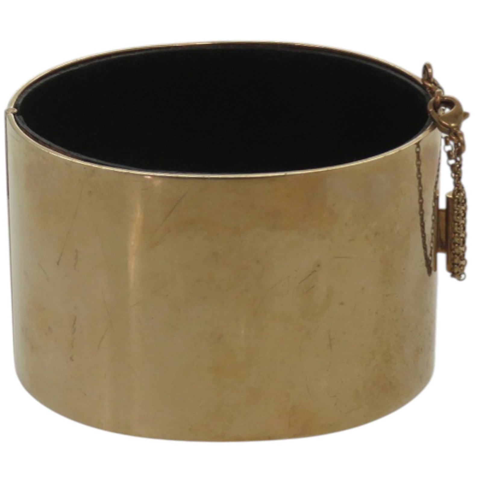 Celine Bangle Leather and Metal: Celine Bangle Leather and Metal Elevate your style with the sophisticated Celine Bangle, boasting sleek leather and metal accents in a timeless gold hue. Its classic design makes it perfect for adding