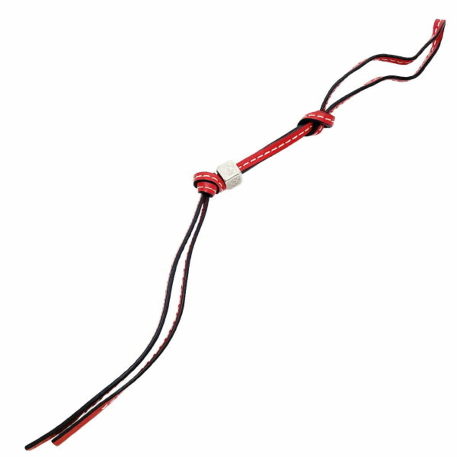 Loewe Handbag with Brass Charm and Leather: Loewe Handbag with Brass Charm and Leather A stunning Loewe handbag with a bold brass charm adds a touch of sophistication to any outfit. Made from rich, supple calfskin leather and adorned with a str