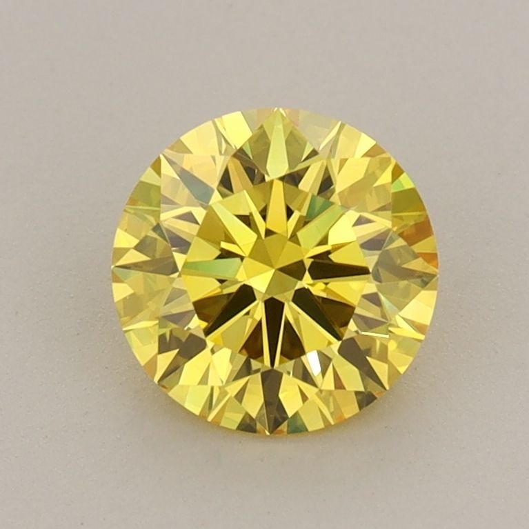 IGI Round 1.01ct Fancy Vivid Yellow VVS2 Ideal Loose Lab Diamond: IGI Round 1.01ct Fancy Vivid Yellow VVS2 Ideal Loose Lab Diamond Experience the brilliance of nature's own sunshine in this stunning 1.01ct Fancy Vivid Yellow VVS2 Ideal lab-grown diamond, certified b