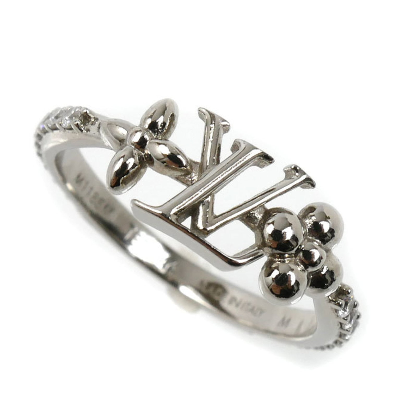 Louis Vuitton Band Ring in Metal: Louis Vuitton Band Ring in Metal A sleek and sophisticated Louis Vuitton band ring, crafted from high-quality metal, adds a touch of luxury to any outfit. With its classic design and iconic brand logo