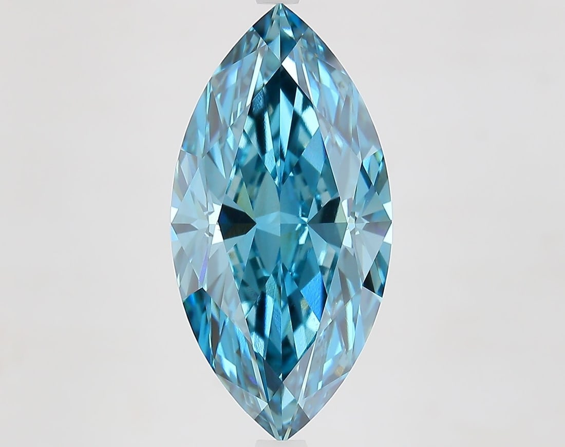IGI Marquise 6.06ct Fancy Vivid Blue VVS2 Loose Lab Diamond: IGI Marquise 6.06ct Fancy Vivid Blue VVS2 Loose Lab Diamond Experience the rare beauty of a Fancy Vivid Blue lab diamond, boasting exceptional clarity and polish in a unique and captivating color. Thi