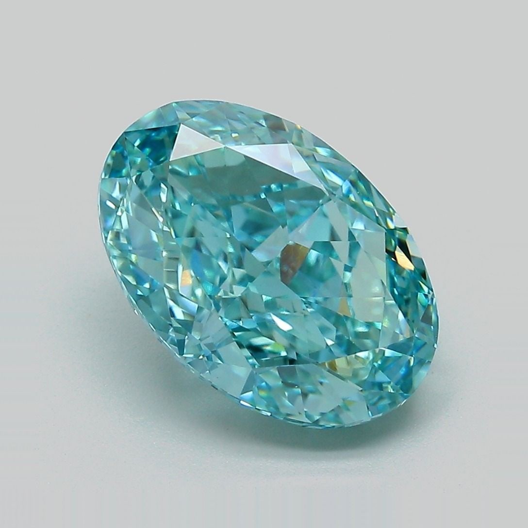 IGI Oval 5.51ct Fancy Vivid Greenish Blue VVS2 Loose Lab Diamond: IGI Oval 5.51ct Fancy Vivid Greenish Blue VVS2 Loose Lab Diamond Experience the breathtaking beauty of this stunning 5.51ct Fancy Vivid Greenish Blue VVS2 lab-grown diamond, certified by IGI and boast