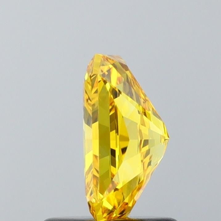 IGI Radiant 1.0ct Fancy Vivid Yellow VVS2 Loose Lab Diamond: IGI Radiant 1.0ct Fancy Vivid Yellow VVS2 Loose Lab Diamond Experience the brilliance of a lab-grown diamond, certified by IGI as a 1.0ct Fancy Vivid Yellow VVS2 gemstone. This exquisite stone boasts