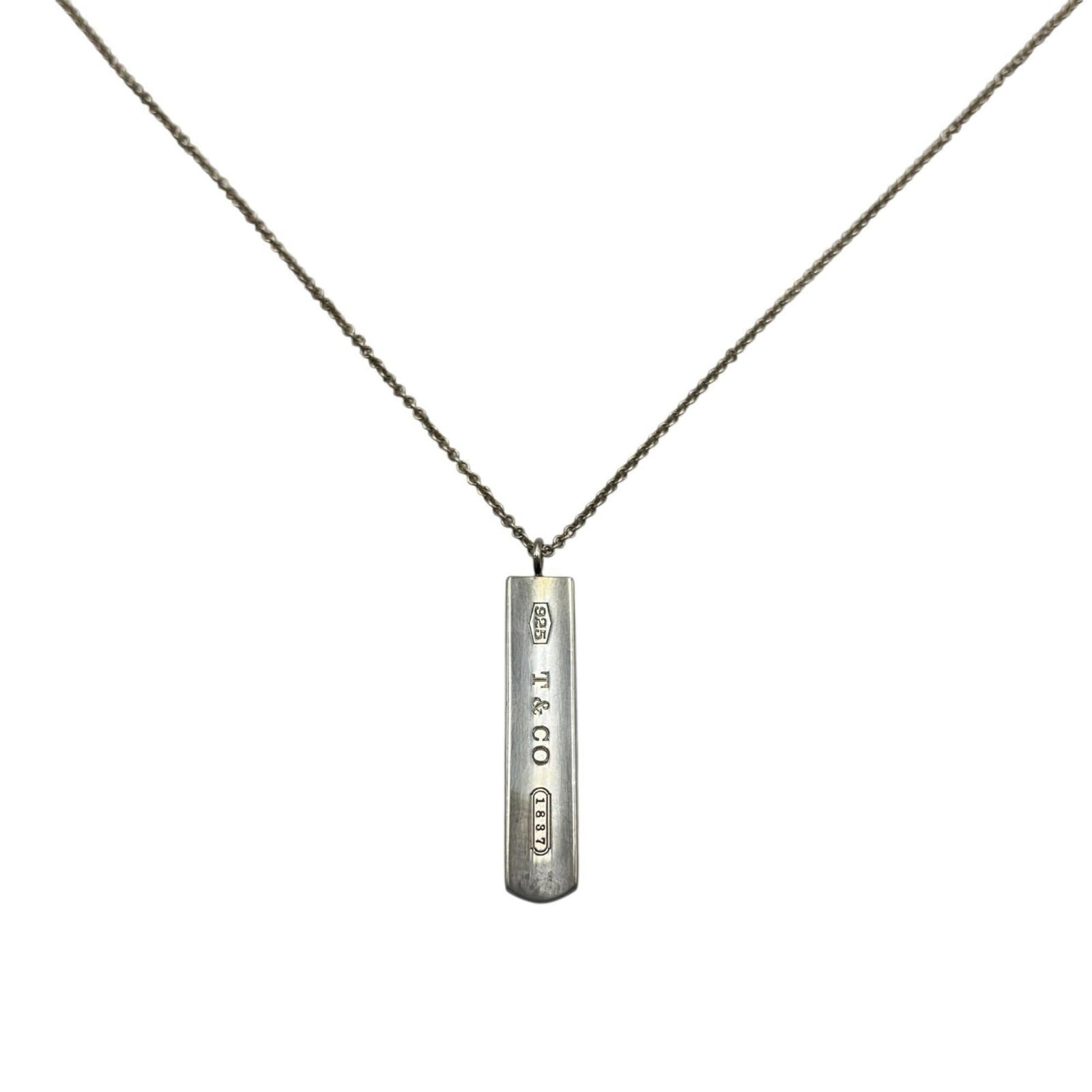 Tiffany & Co. Sterling Silver Bar Pendant Necklace for Women: Tiffany & Co. Sterling Silver Bar Pendant Necklace for Women Elevate your style with the timeless elegance of Tiffany & Co.'s sterling silver bar pendant necklace, perfect for adding a touch of sophis