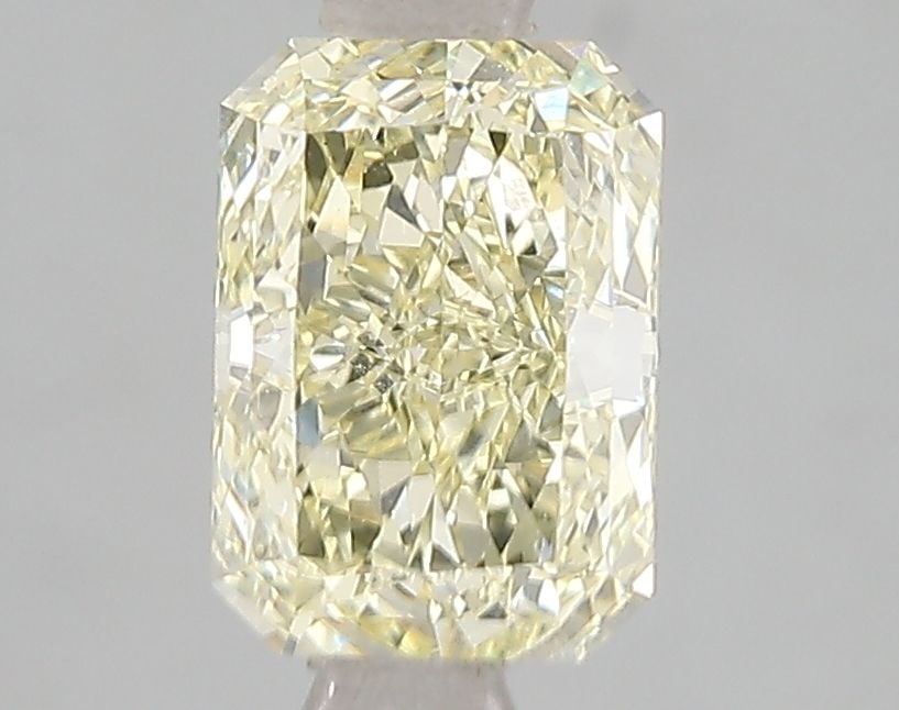 IGI Radiant 1.51ct Fancy Intense Yellow VVS2 Loose Lab Diamond: IGI Radiant 1.51ct Fancy Intense Yellow VVS2 Loose Lab Diamond Experience the vibrant beauty of nature in this exquisite 1.51ct Fancy Intense Yellow VVS2 lab-grown diamond, boasting an EX polish and