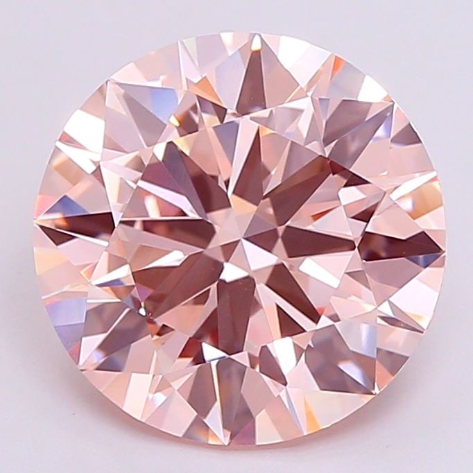 IGI Round 7.01ct Fancy Pink VVS2 Loose Lab Diamond: IGI Round 7.01ct Fancy Pink VVS2 Loose Lab Diamond Experience the rare beauty of a Fancy Pink diamond, one of the most coveted colors in nature. This exquisite 7.01ct lab-grown gem boasts exceptional